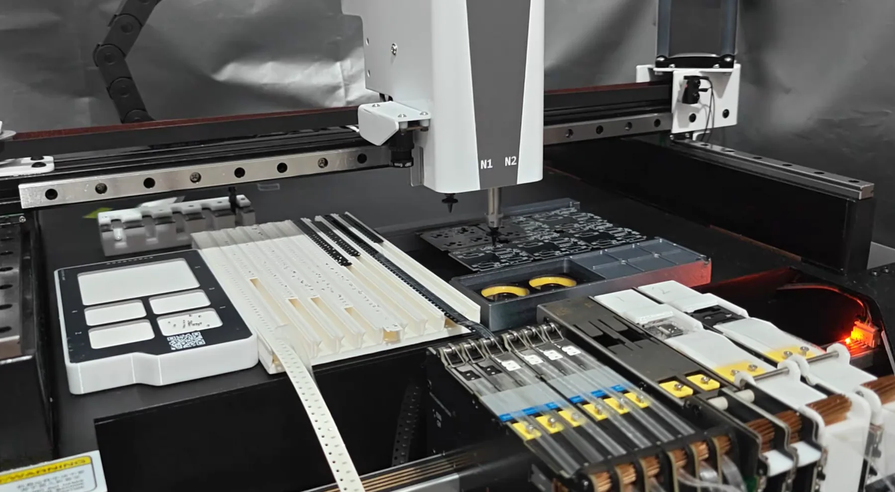 Pick-and-place machine assembling circuit boards